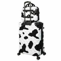 IT Luggage Indulging - 4pc Set (Moo Cow Print) -UK Suitcase Sales 2024 33198 UK16 3039A08 16 3039A15Moocowblack whiterepeatprintSSBackpanel